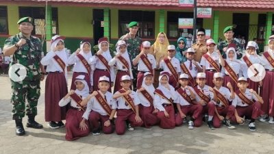 SDN 2 Margadadi dan Babinsa Posramil Jati Agung Laksanakan Upacara Bersama