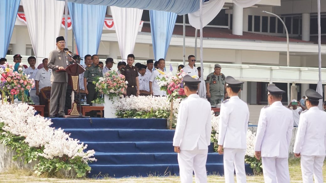 Bupati Pesisir Barat Kukuhkan Peratin dan Ketua TP PKK Pekon