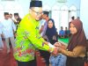 Pj Bupati Tulang Bawang Serahkan Langsung Bantuan Baznas, Dorong Kesejahteraan Masyarakat