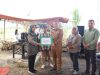 Unila Serahkan Mesin Pembelah Bambu ke Desa Trimulyo