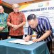 Pj Bupati Tulang Bawang Hadiri Penandatanganan Kesepakatan Bersama dengan Kejari Tulang Bawang