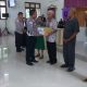 Polres Sangihe Gelar Minggu Kasih, Salurkan Bansos di GMIST Efata Kolongan Mitung