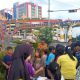 Taring Lampung Bagi Takjil Gratis di JPO Siger Milenial