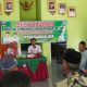 Suasana penyaluran Bantuan Langsung Tunai Dana Desa (BLT-DD) Tahap I Tahun 2025 di Balai Pekon Bandar Jaya, Kecamatan Ngaras, Kabupaten Pesisir Barat, Rabu (14/5/2025). Sebanyak 20 Keluarga Penerima Manfaat (KPM) menerima bantuan sebesar Rp900.000 untuk alokasi Januari–Maret.