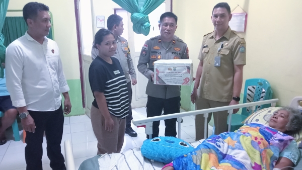 Rayakan HUT ke-79 Bhayangkara, Polsek Manganitu Selatan Beri Bantuan ke Warga Kurang Mampu