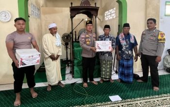 Kapolsek Manganitu Selatan Gelar Bakti Sosial dan Sampaikan Himbauan Kamtibmas