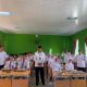 Para siswa MAN 1 Bandar Lampung mengikuti kegiatan Program Makan Bergizi Gratis (MBG) hari pertama dengan penuh antusias.