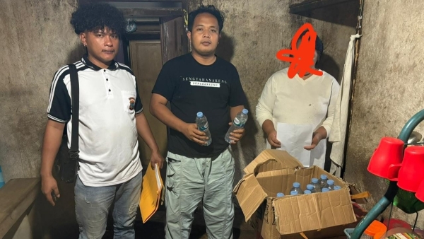 Satresnarkoba Polres Sangihe Sita Puluhan Botol Miras Tanpa Izin Edar di Manganitu