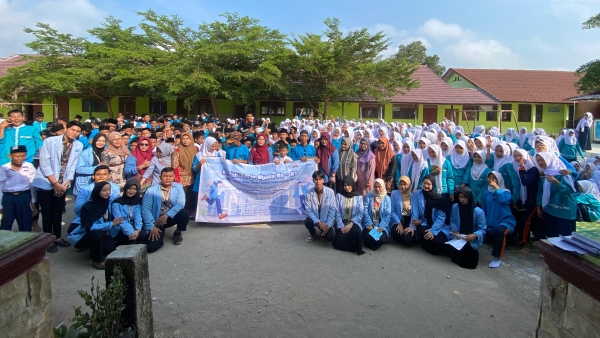 Mahasiswa KKN UIN Raden Fatah Edukasi QRIS dan Rupiah di Tanjung Raja